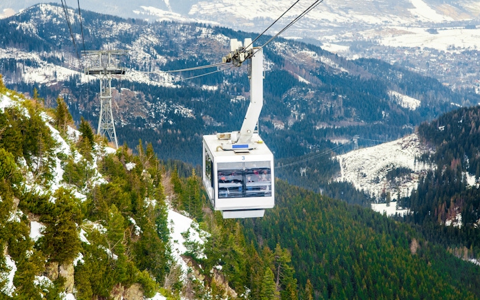 Cable car over snowy Tatra Mountains near Morskie Oko, Zakopane.