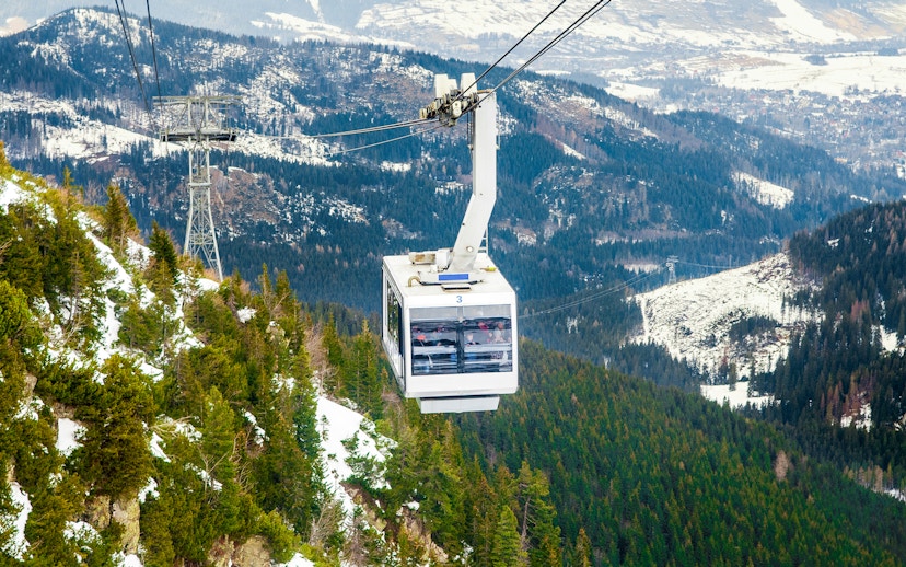 Cable car over snowy Tatra Mountains near Morskie Oko, Zakopane.