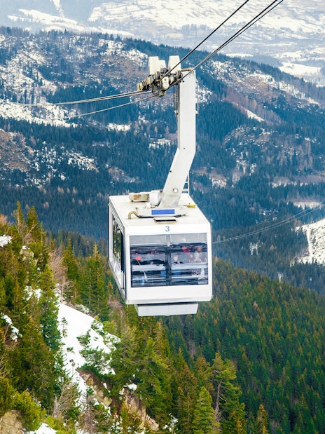 Cable car over snowy Tatra Mountains near Morskie Oko, Zakopane.