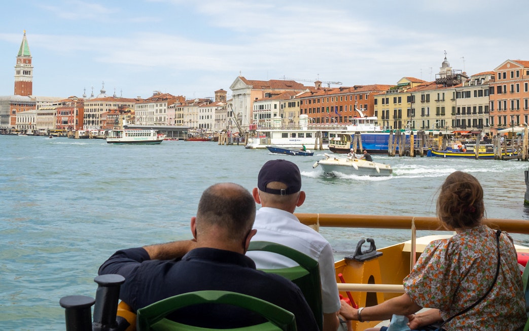 Vaporetto passengers view Castello and San Marco, Venice.