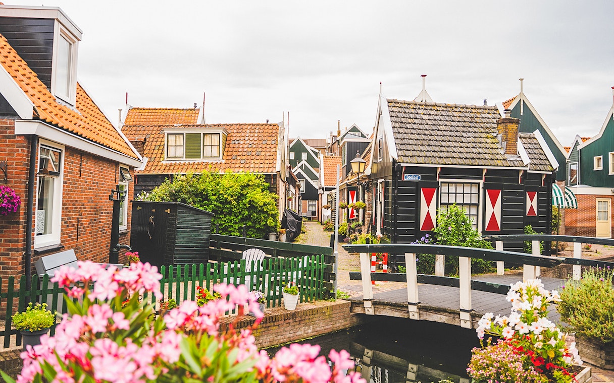 Charming houses and a small bridge in Volendam, Netherlands.