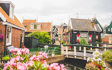 Charming houses and a small bridge in Volendam, Netherlands.