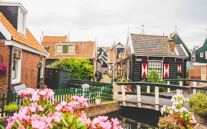 Charming houses and a small bridge in Volendam, Netherlands.