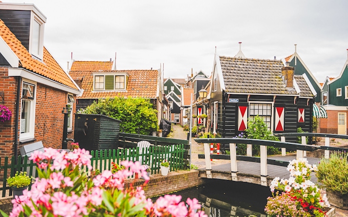 Charming houses and a small bridge in Volendam, Netherlands.