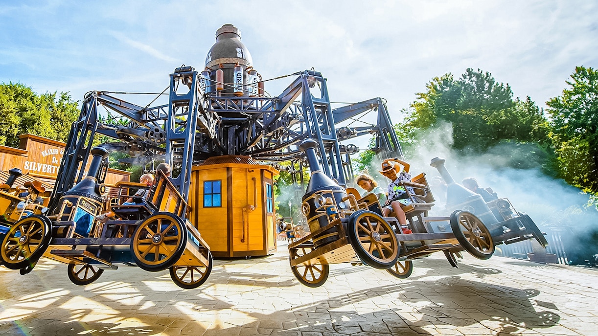 Tourists on Silverton ride at Walibi Belgium roller coaster.