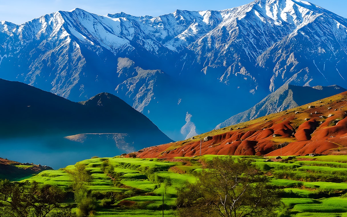 Terraced fields with Atlas Mountains in Agafay Desert, Marrakech.