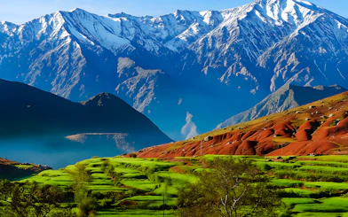 Terraced fields with Atlas Mountains in Agafay Desert, Marrakech.