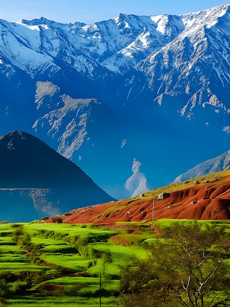 Terraced fields with Atlas Mountains in Agafay Desert, Marrakech.