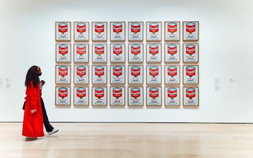 Visitors viewing Warhol's Campbell's Soup Cans at the Combo Save 27% tour exhibit.