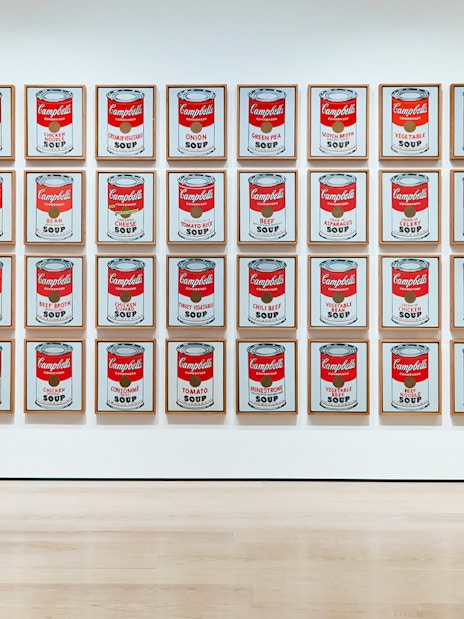 Visitors viewing Warhol's Campbell's Soup Cans at the Combo Save 27% tour exhibit.