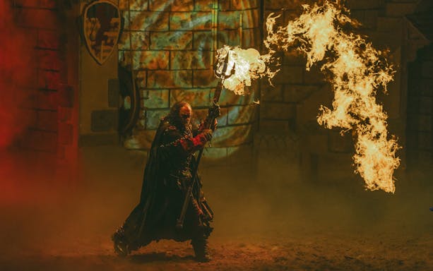 Performer with flaming staff at Tournament of Kings show in Las Vegas.