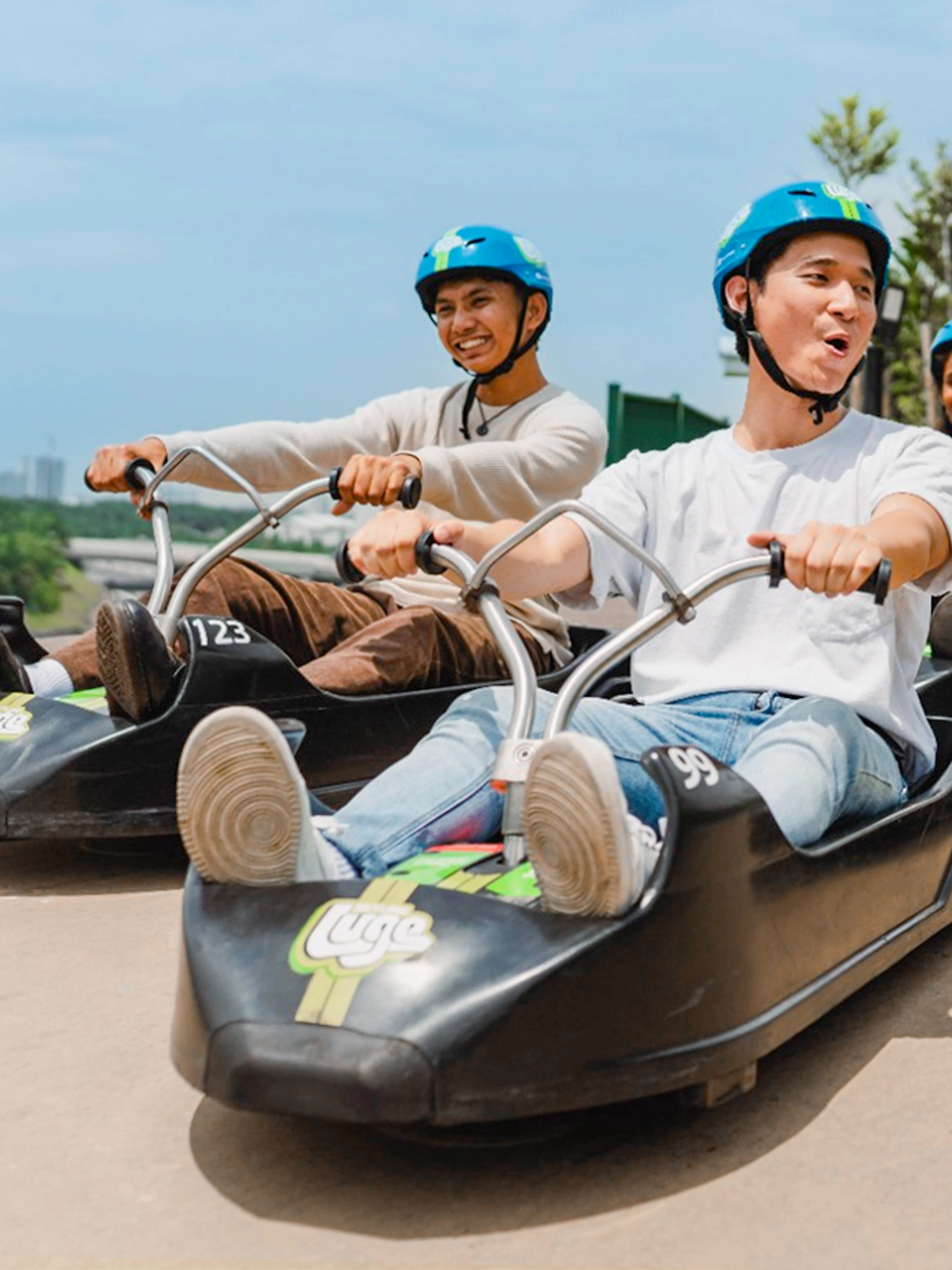 People enjoying luge ride at Skyline Luge Kuala Lumpur.