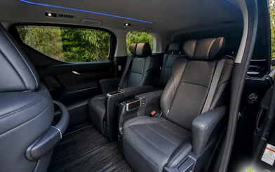 Luxury vehicle interior for private transfer from Haneda Airport to Tokyo city.