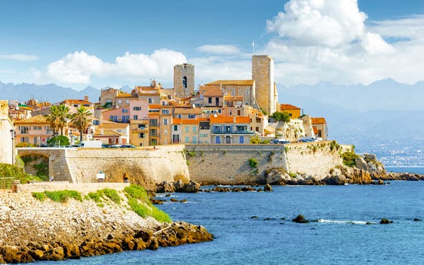 Antibes town with historic buildings and sea view, France.