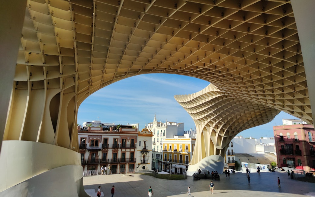 Visitors exploring Setas de Sevilla structure in Seville, Spain.