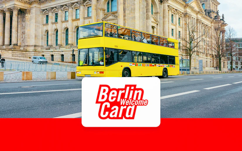 Yellow double-decker bus in front of Berlin landmark with Berlin Welcome Card logo.