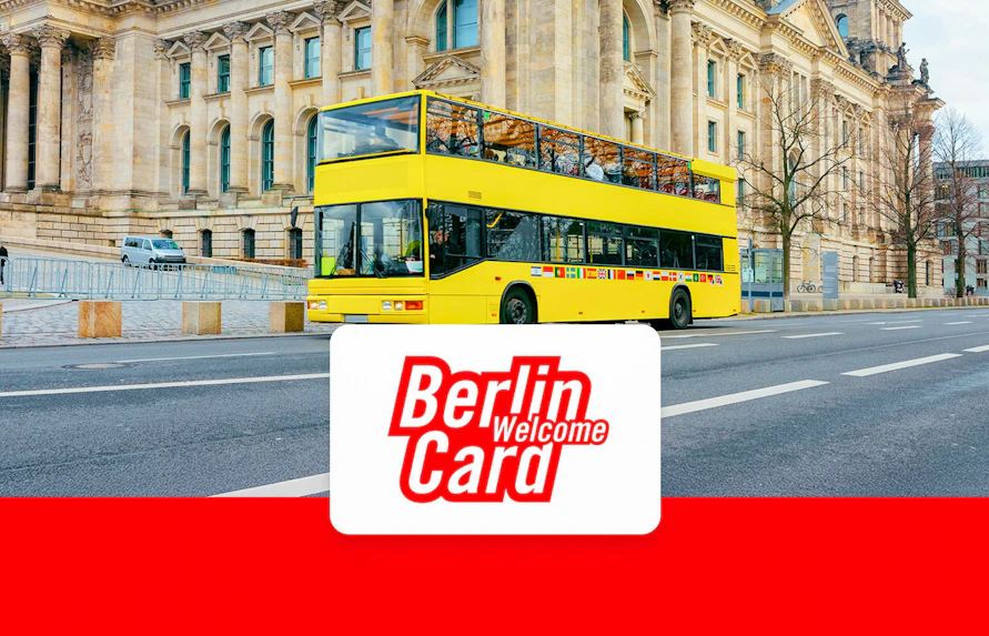 Yellow double-decker bus in front of Berlin landmark with Berlin Welcome Card logo.