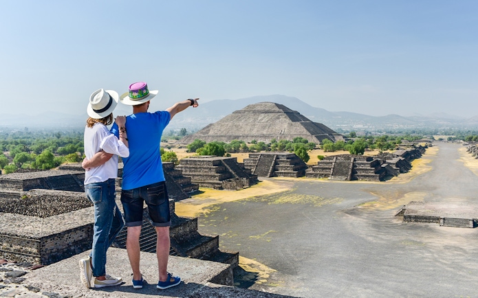 Tourists viewing Pyramid of the Sun at Teotihuacán, Mexico.