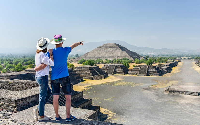 Tourists viewing Pyramid of the Sun at Teotihuacán, Mexico.