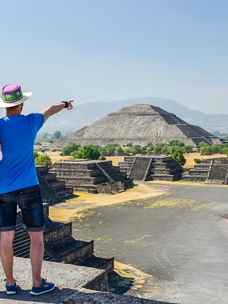 Tourists viewing Pyramid of the Sun at Teotihuacán, Mexico.