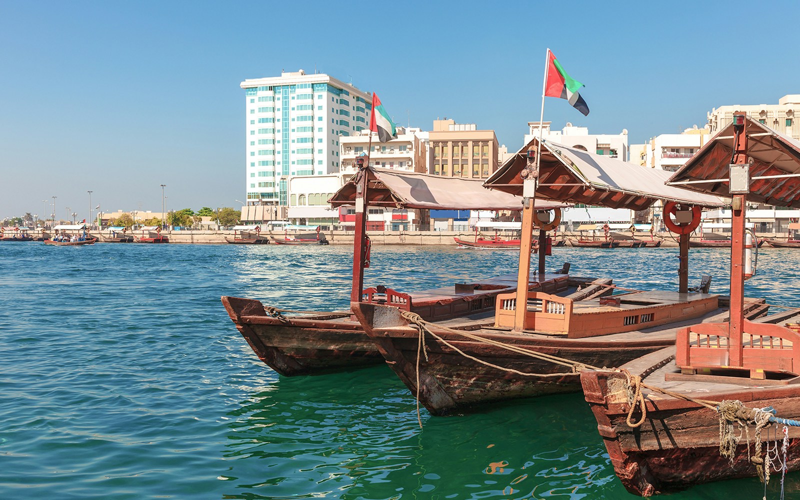 magnificent views of boats docked in dubai canal