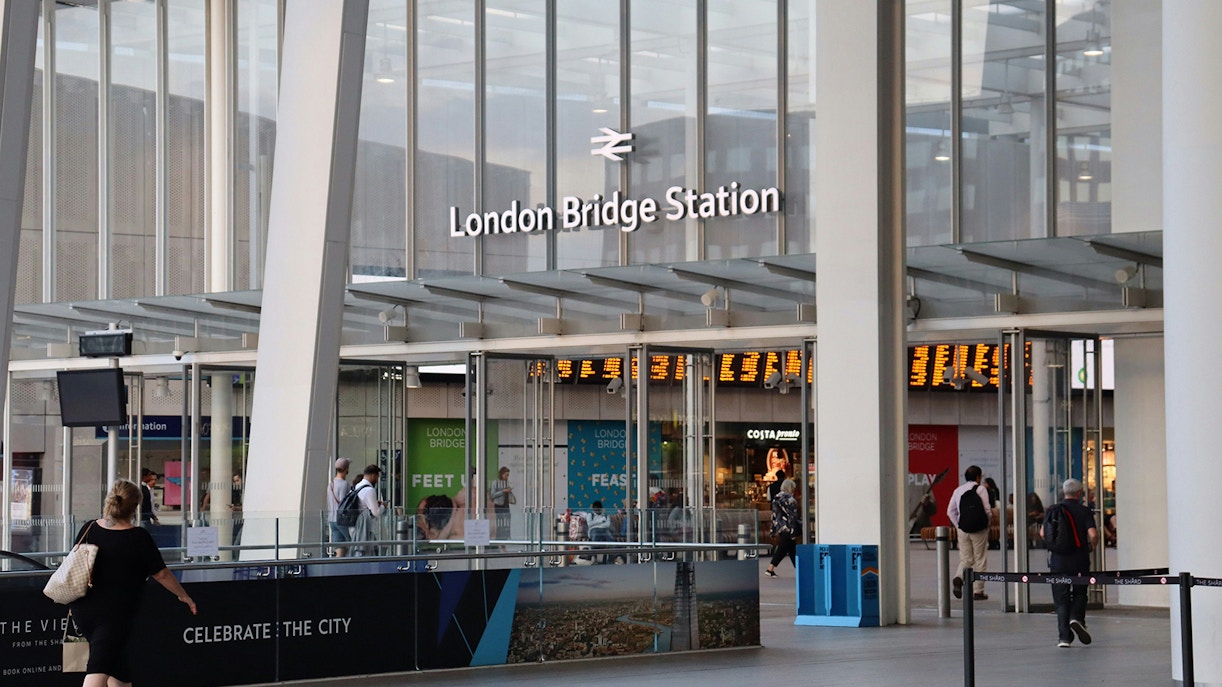 London Bridge Station entrance with people walking nearby.