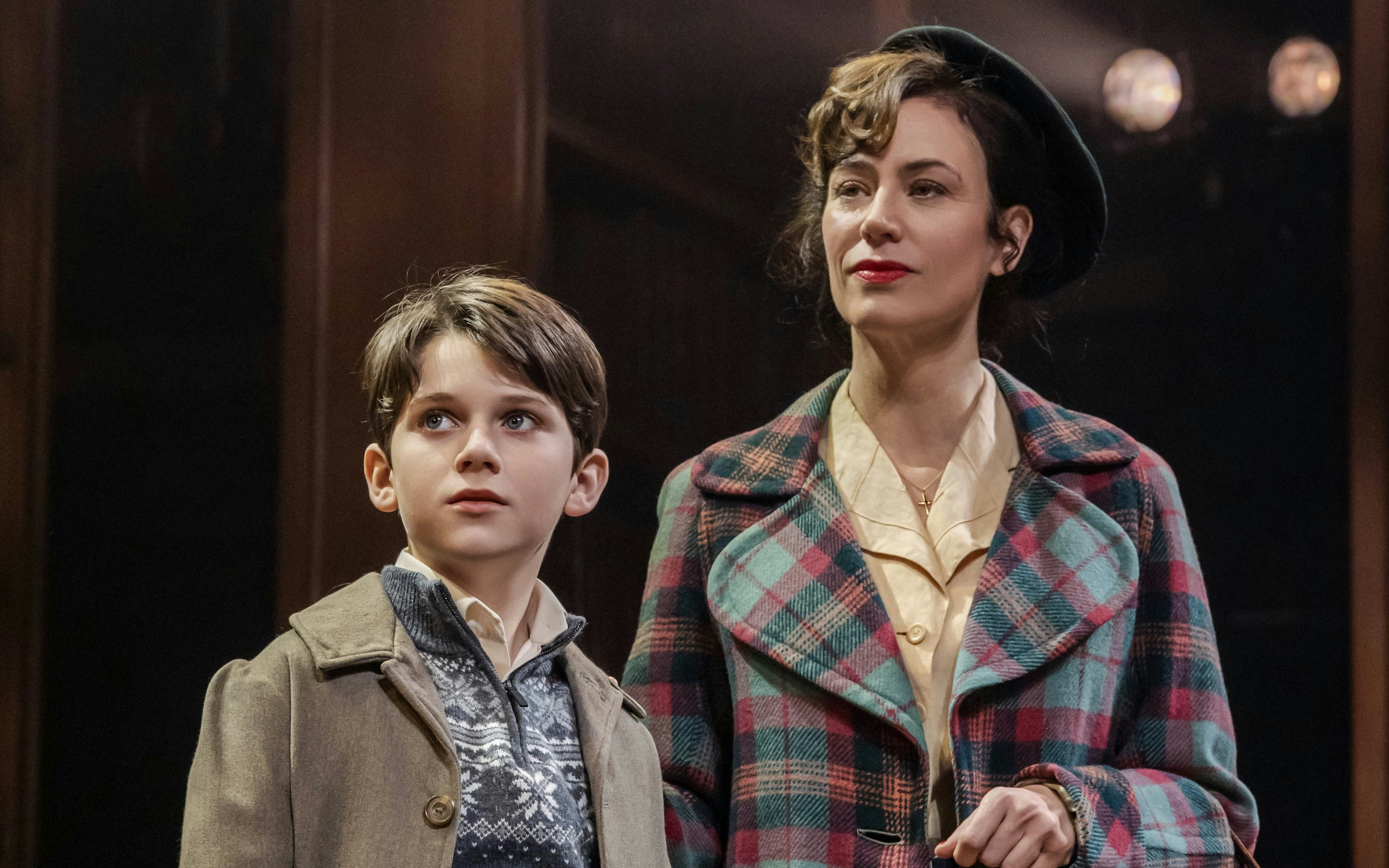Child and woman on stage during Shadowlands performance, Westend.
