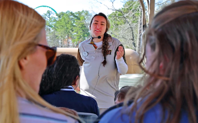 Tour guide speaking to visitors on the Six Flags Wild Safari Off-Road Adventure.