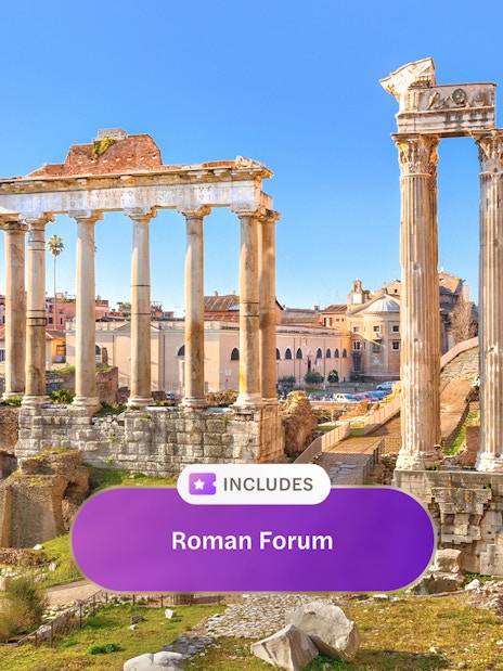Roman Forum ruins with ancient columns in Rome, Italy.