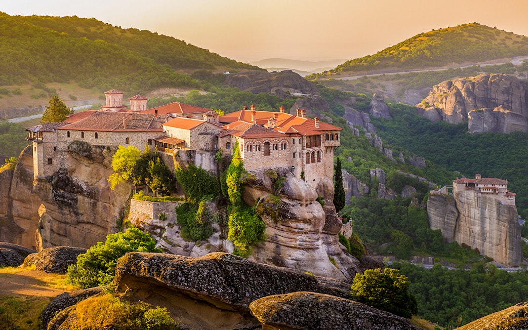 Meteora monastery perched on rock formations in Greece during a guided tour from Athens.