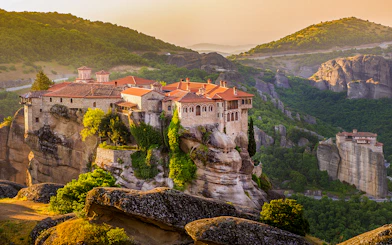 Meteora monastery perched on rock formations in Greece during a guided tour from Athens.