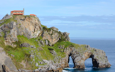 Gaztelugatxe islet with chapel on rocky cliff, San Sebastian tour.
