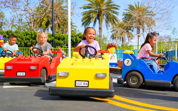 Children driving LEGO cars at Driving School, LEGOLAND® California.