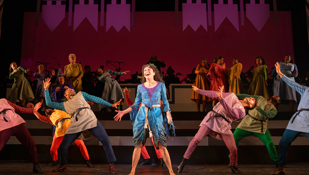 Cast performing a musical number from "Once Upon a Mattress" on stage.