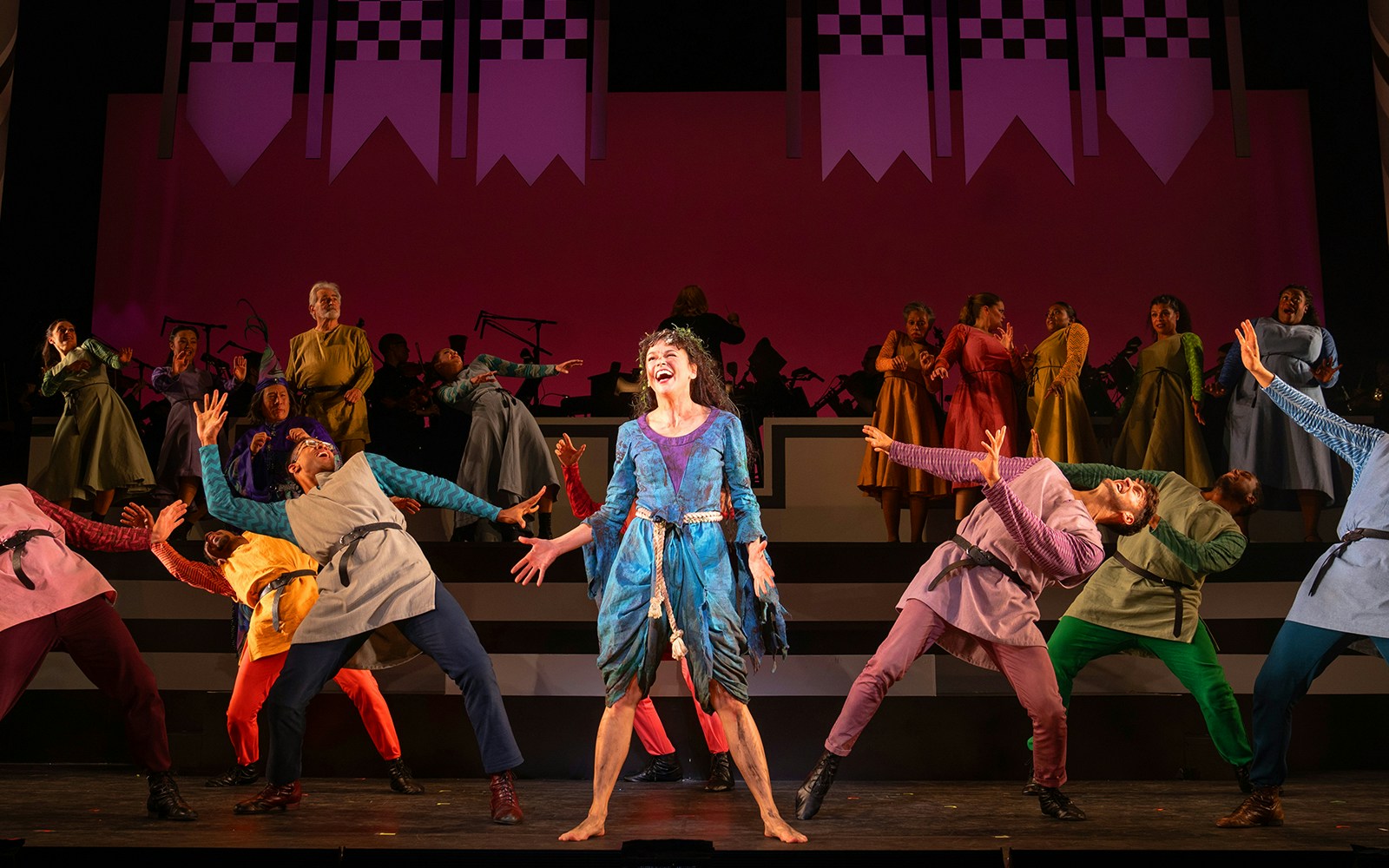Cast performing a musical number from "Once Upon a Mattress" on stage.