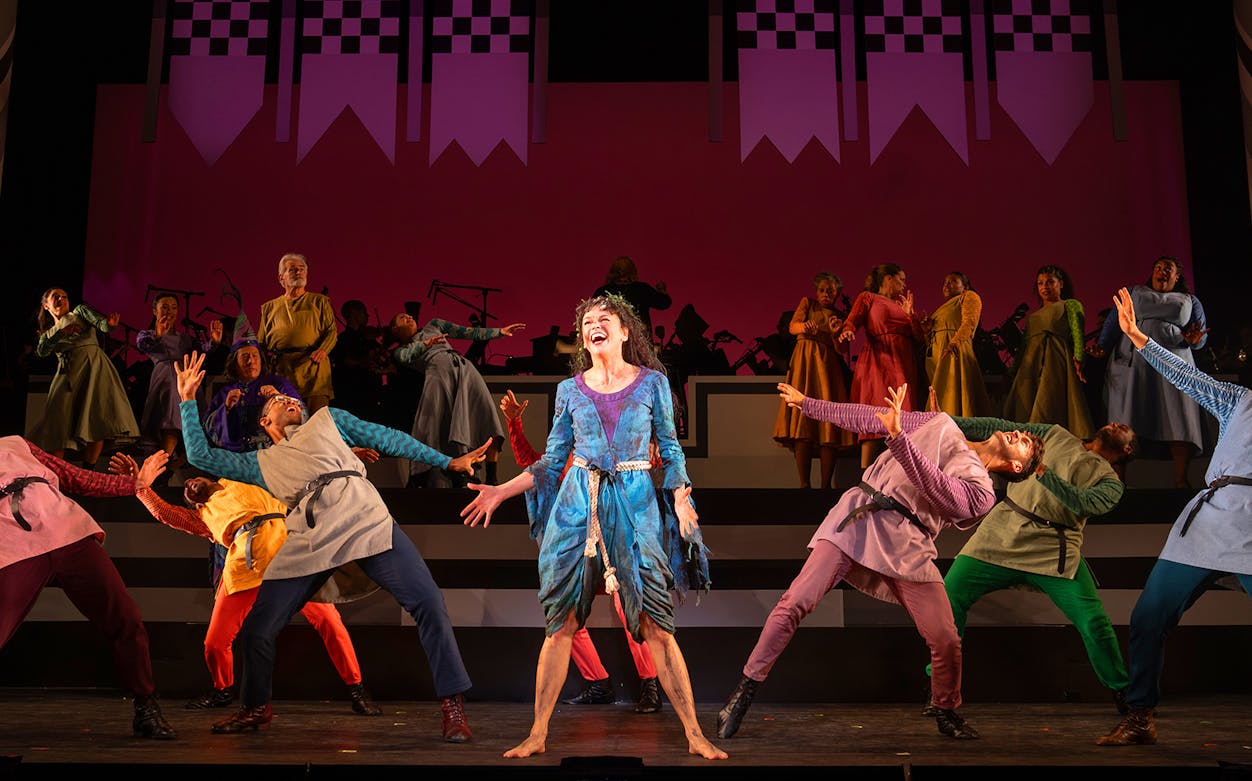 Cast performing a musical number from "Once Upon a Mattress" on stage.