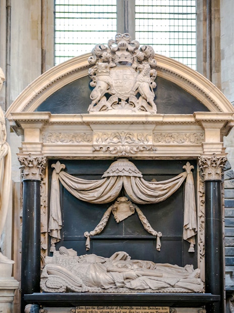 Tomb and statues in Poets' Corner, Westminster Abbey, London.