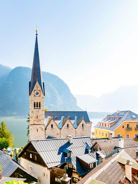 Hallstatt village view with church spire and lake, seen on a day trip from Vienna.