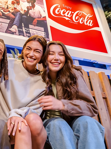 Friends enjoying time at World of Coca-Cola Museum, Atlanta.