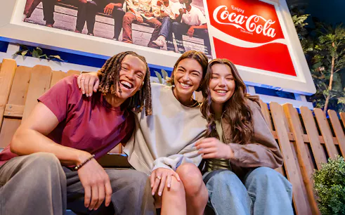 Friends enjoying time at World of Coca-Cola Museum, Atlanta.