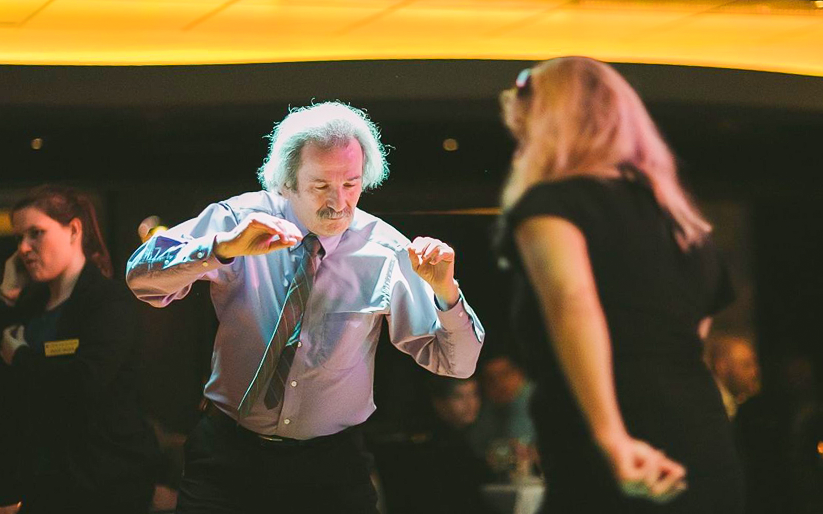 Guests dancing during Odyssey Lake Michigan Dinner Cruise.