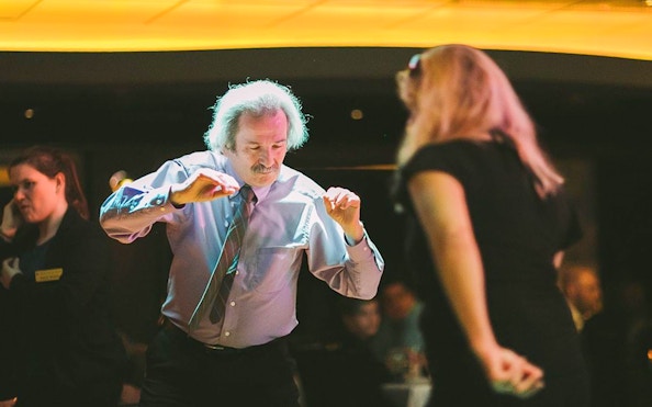Guests dancing during Odyssey Lake Michigan Dinner Cruise.
