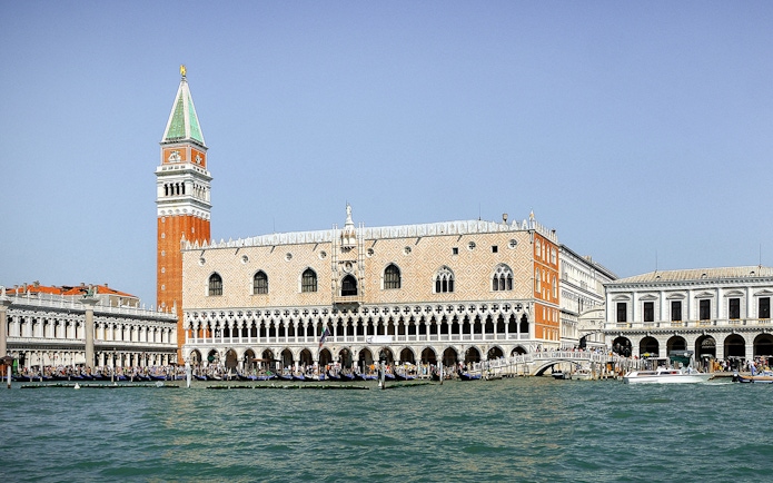Doge's Palace and St. Mark's Campanile viewed from the Grand Canal in Venice.