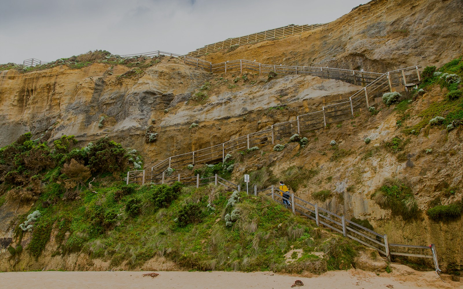 Gibson Steps view on Great Ocean Road Reverse Tour, showcasing coastal cliffs.