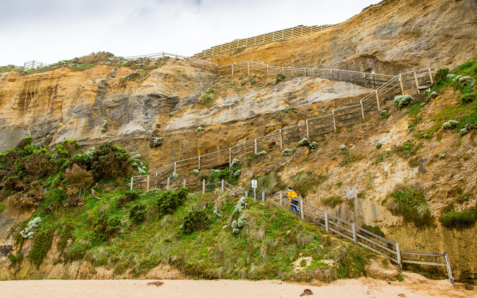 Gibson Steps limestone cliffs and beach view on Great Ocean Road Reverse Tour, Australia.