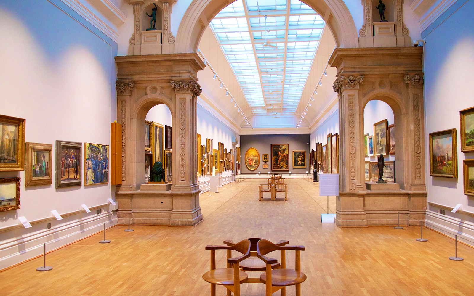 Tourists admiring the Mona Lisa at the Louvre Museum, Paris, with direct access.