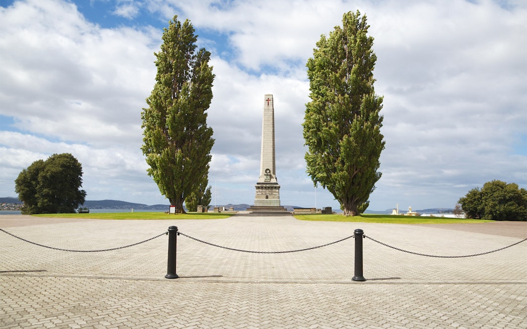 Hobart Cenotaph with tall trees and waterfront view in Tasmania.