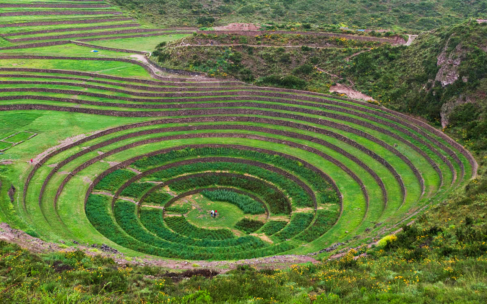 Terraced circular depressions at Moray archaeological site, Sacred Valley, near Cusco, Peru.