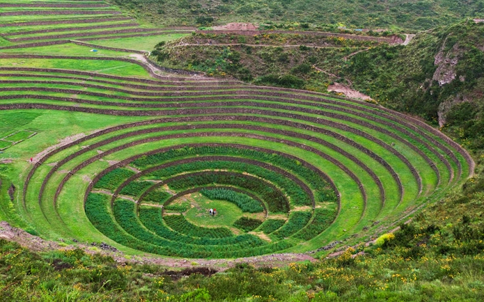 Terraced circular depressions at Moray archaeological site, Sacred Valley, near Cusco, Peru.
