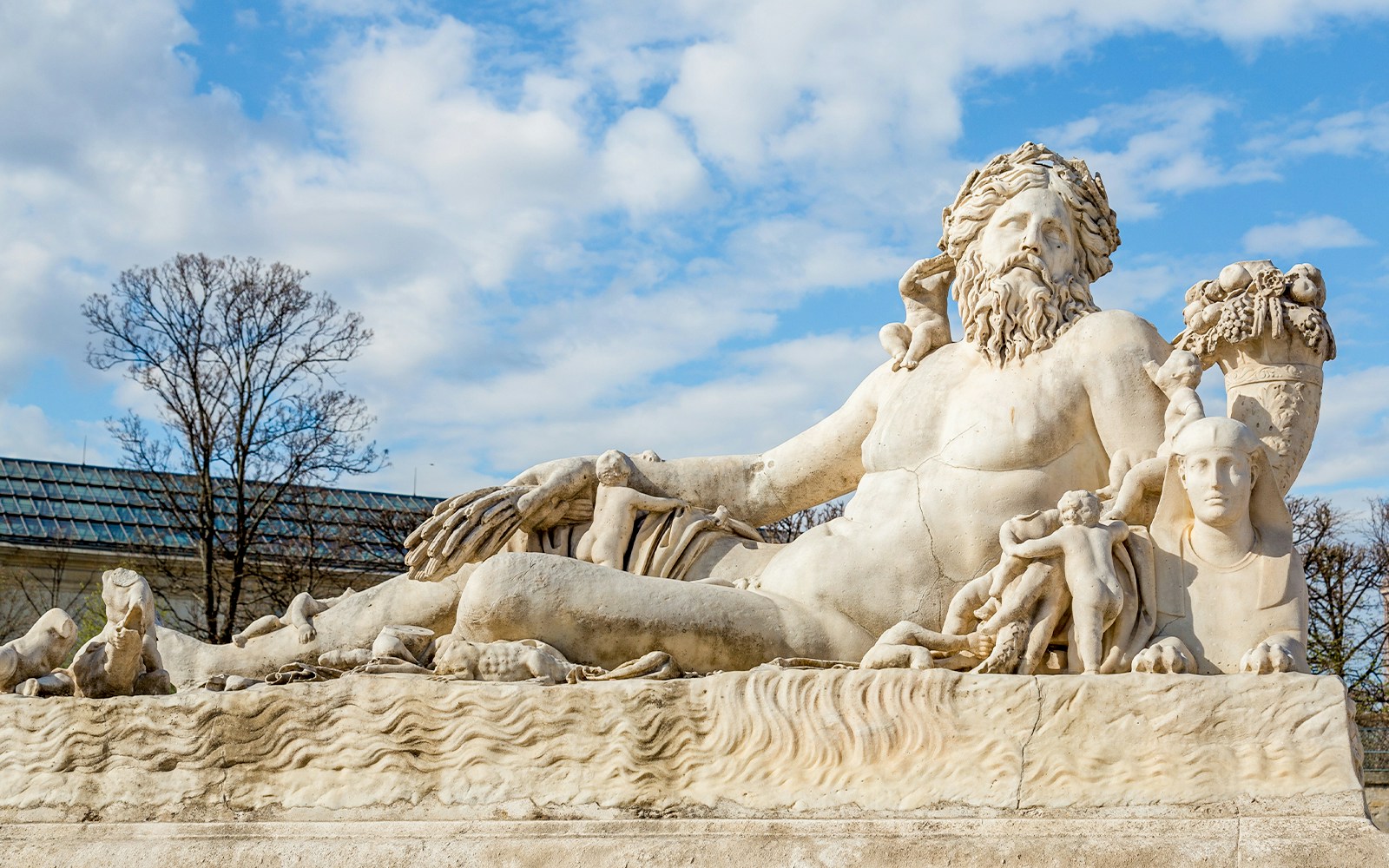 The Nile by Pierre Bourdict statue in Tuileries Garden, Paris, featuring intricate details and historical significance.